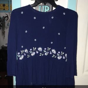 Blue blouse with flowers
